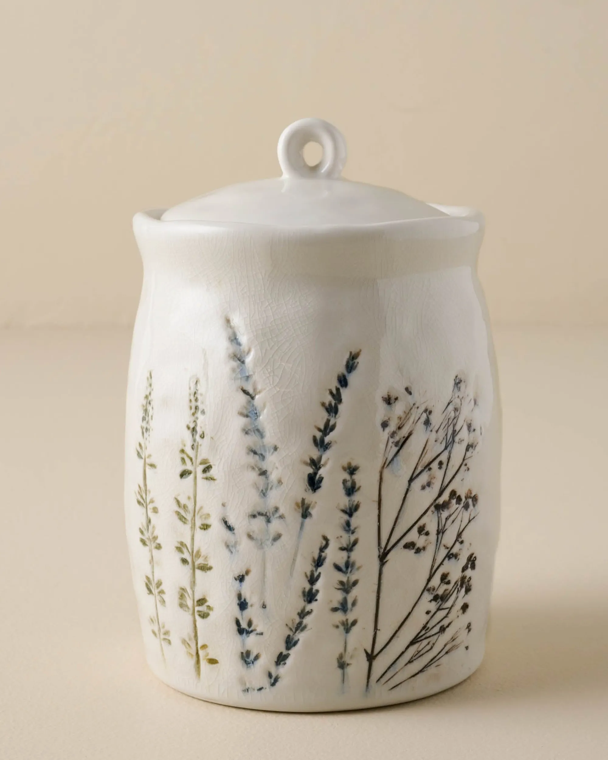 VND0164 Creative Co-op Inc Pressed Floral Ceramic Canister